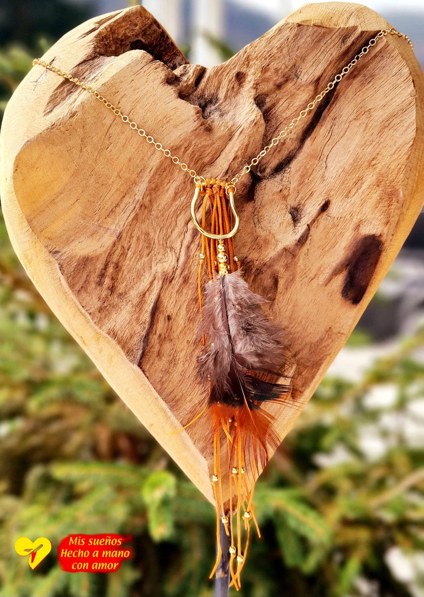 La pluma Halskette