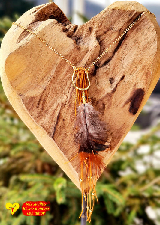 La pluma Halskette