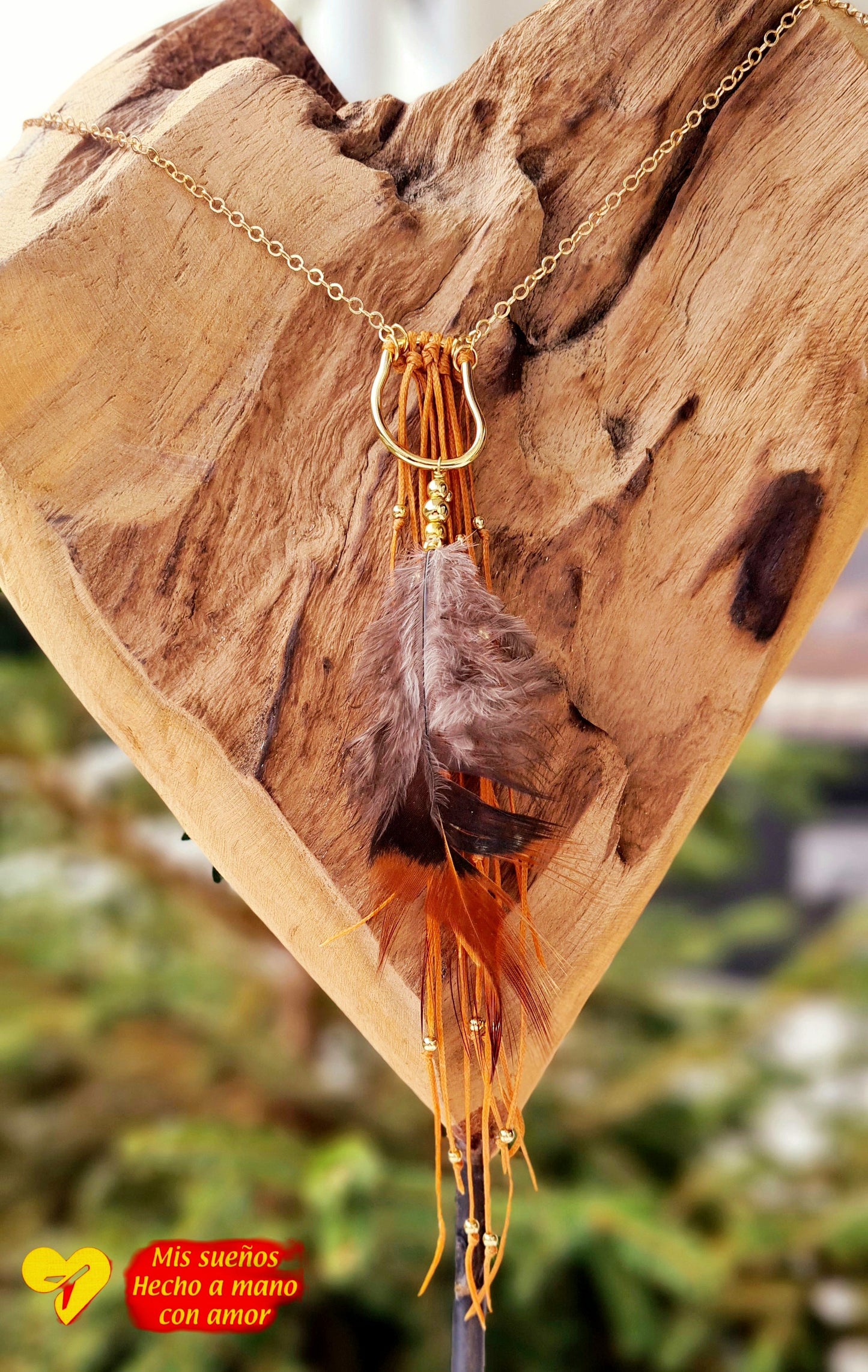 La pluma Halskette